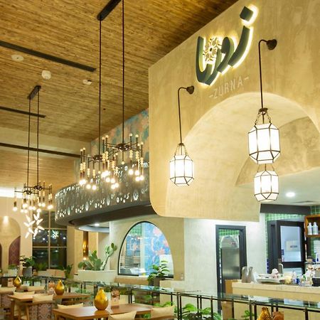Citadines Abha Aparthotel Exteriör bild Interior of the restaurant