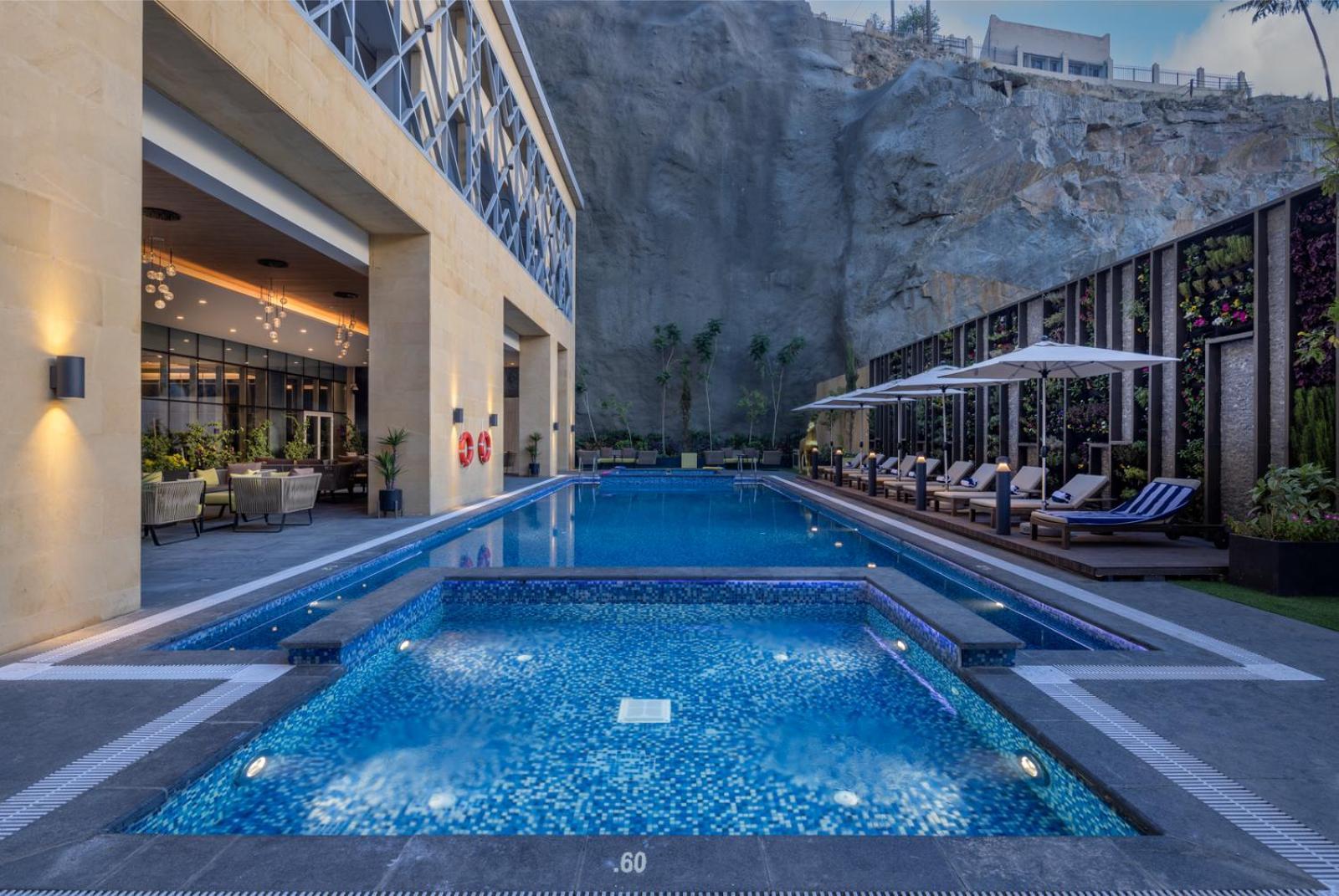 Citadines Abha Aparthotel Exteriör bild Pool at the hotel