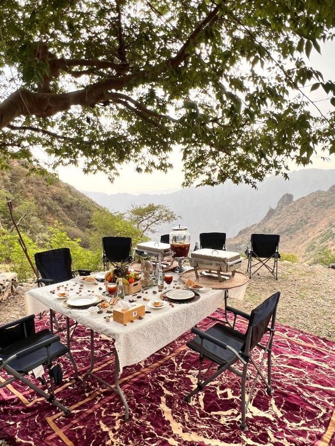 Citadines Abha Aparthotel Exteriör bild A picnic in the mountains of Oman