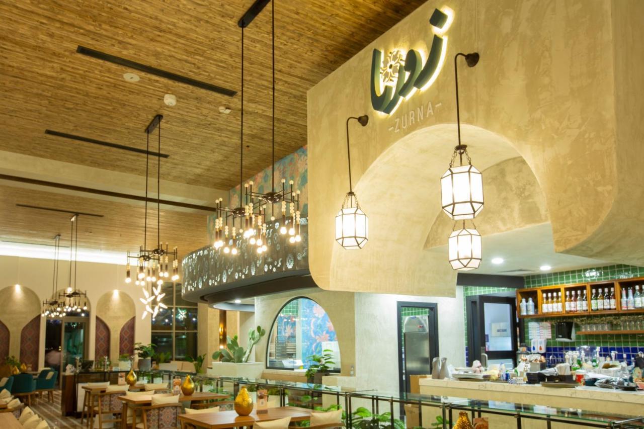 Citadines Abha Aparthotel Exteriör bild Interior of the restaurant