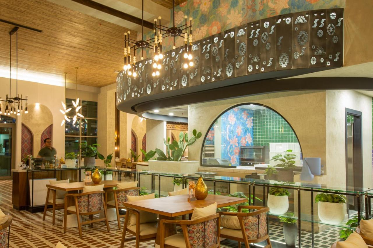 Citadines Abha Aparthotel Exteriör bild The interior of the restaurant