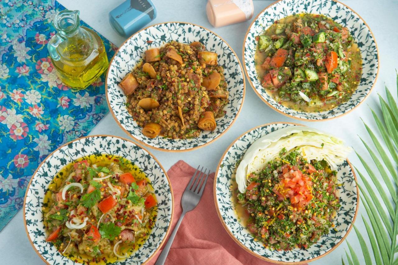 Citadines Abha Aparthotel Exteriör bild Israeli salads